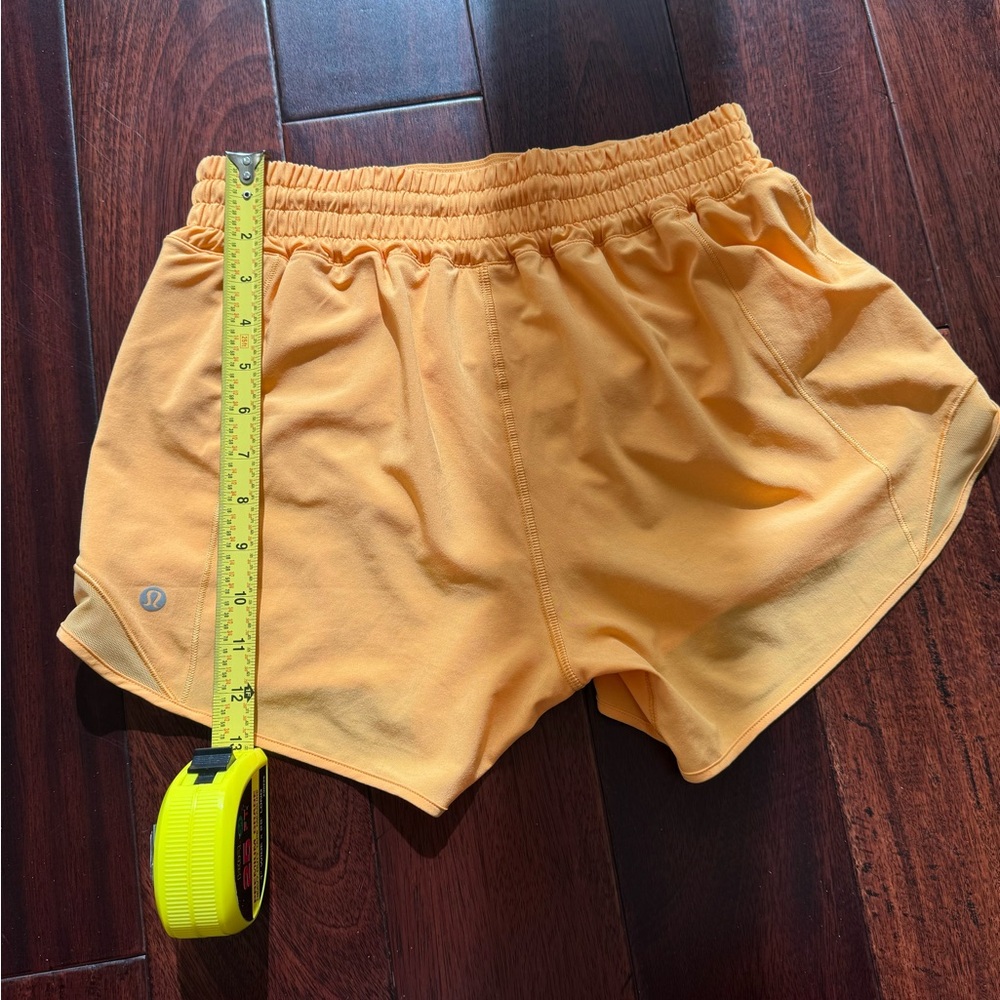 Selling Lululemon shorts size 6 in orange color - Picture 6 of 9